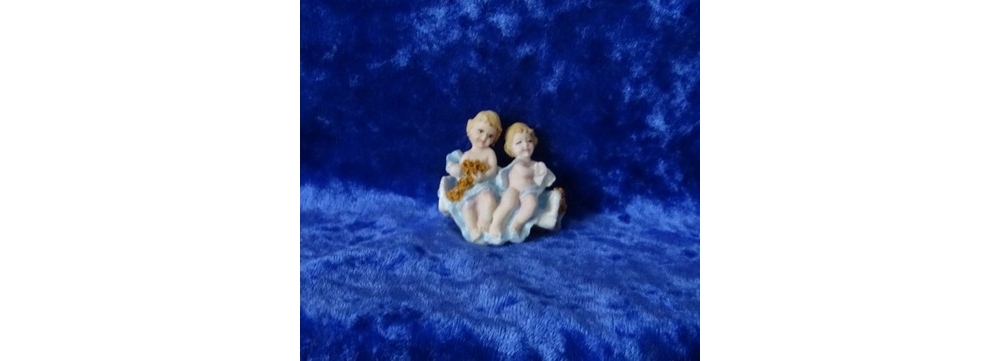 cherubs on a swing seat painted blue